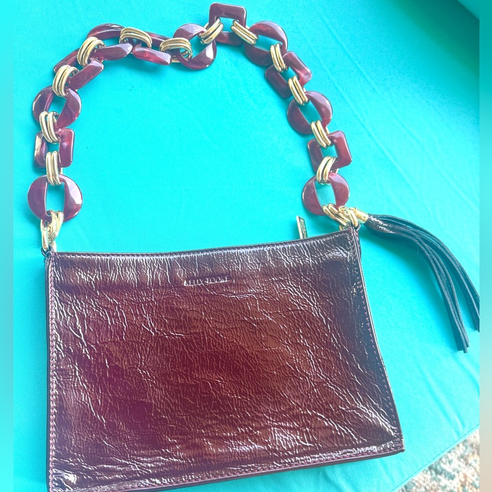 NWOT! Patent crinkle leather bag with decorative acrylic strap from Kelly Tooke
